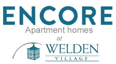 A logo for apartment homes at Welden Village.